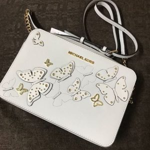 white butterfly michael kors bag